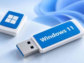 Pendrive Windows 11 en fondo azul minimalista